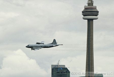 The CP-140 streaking by the CN Tower during  CIAS 2010.